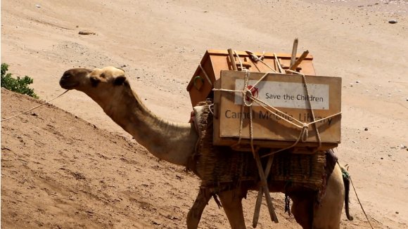 servicio de biblioteca mediante camello - Save the Children