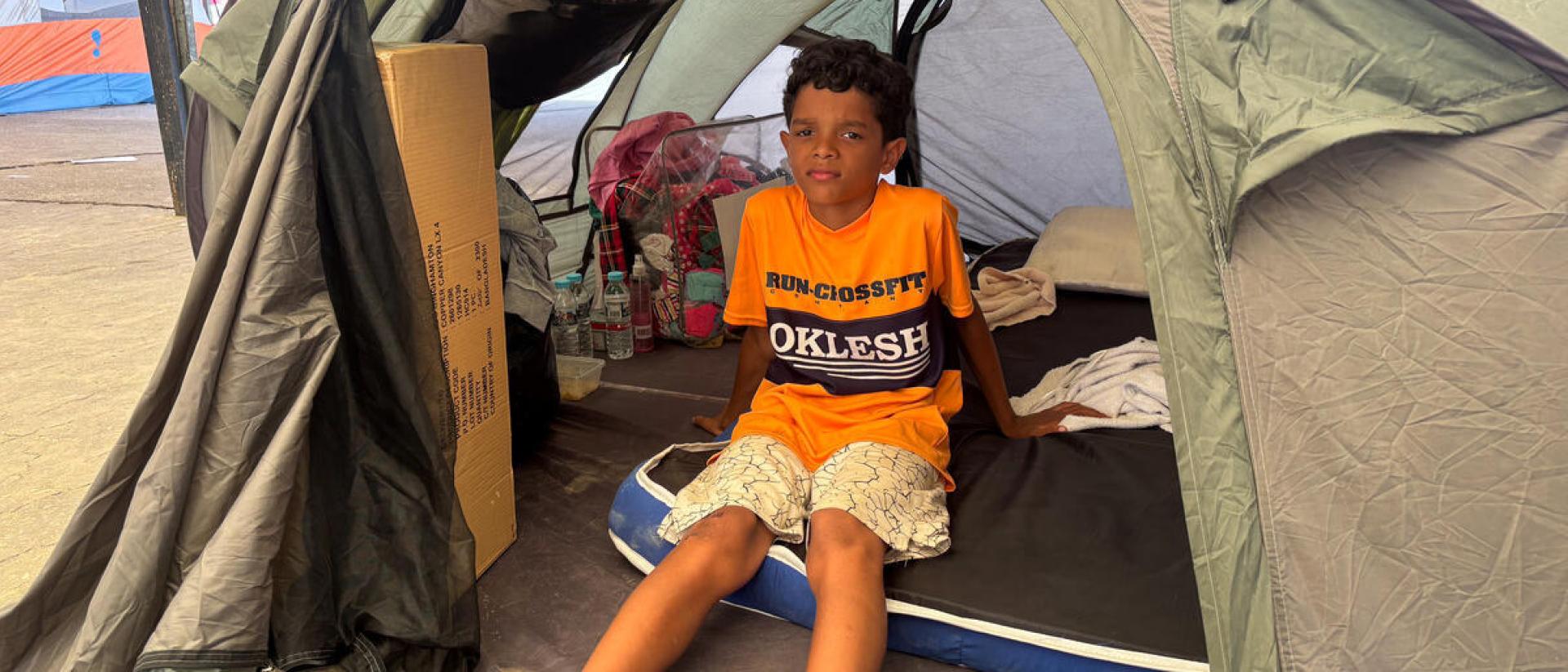 Jose, 11 años. Venezuela. Vive en una tienda