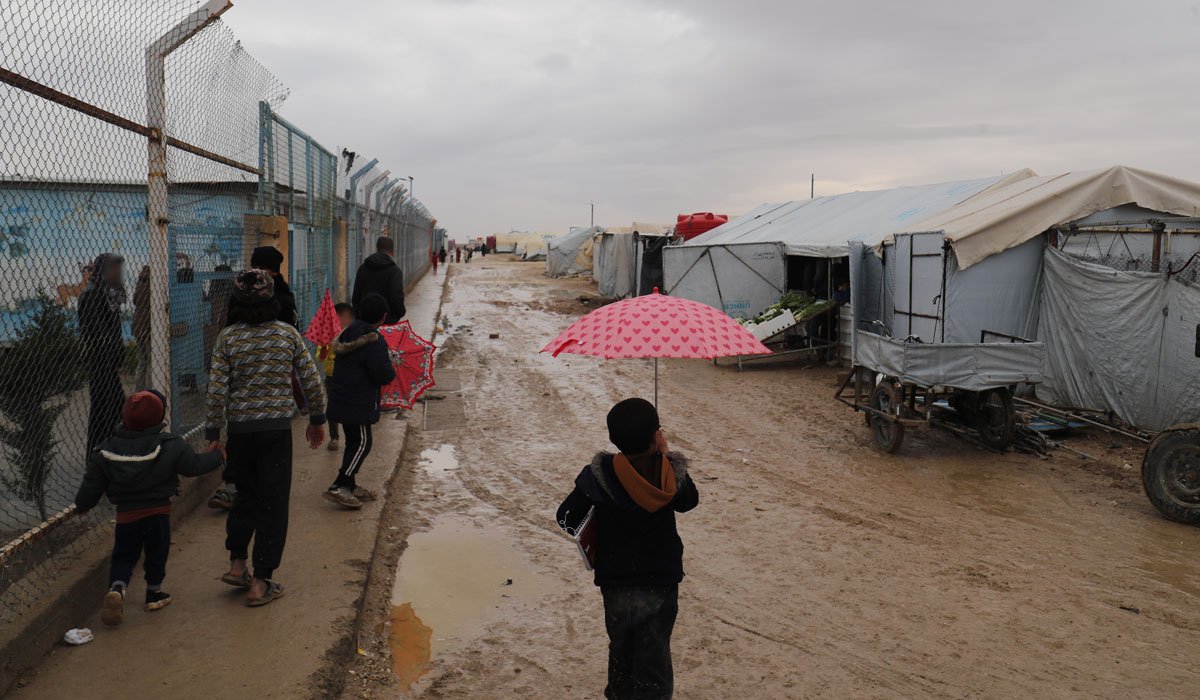 Niños y niñas de un campo de refugiados en Siria